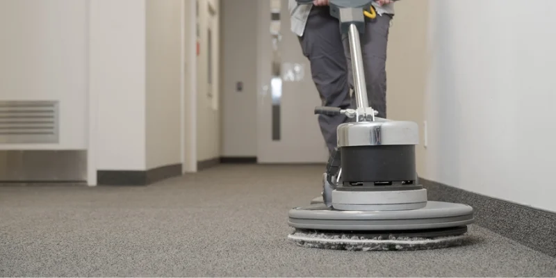 Wicker chair on blue rug